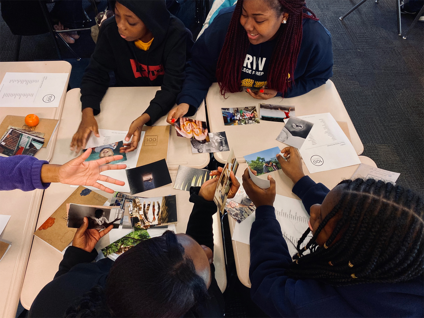 DRW College Prep students view photo examples.