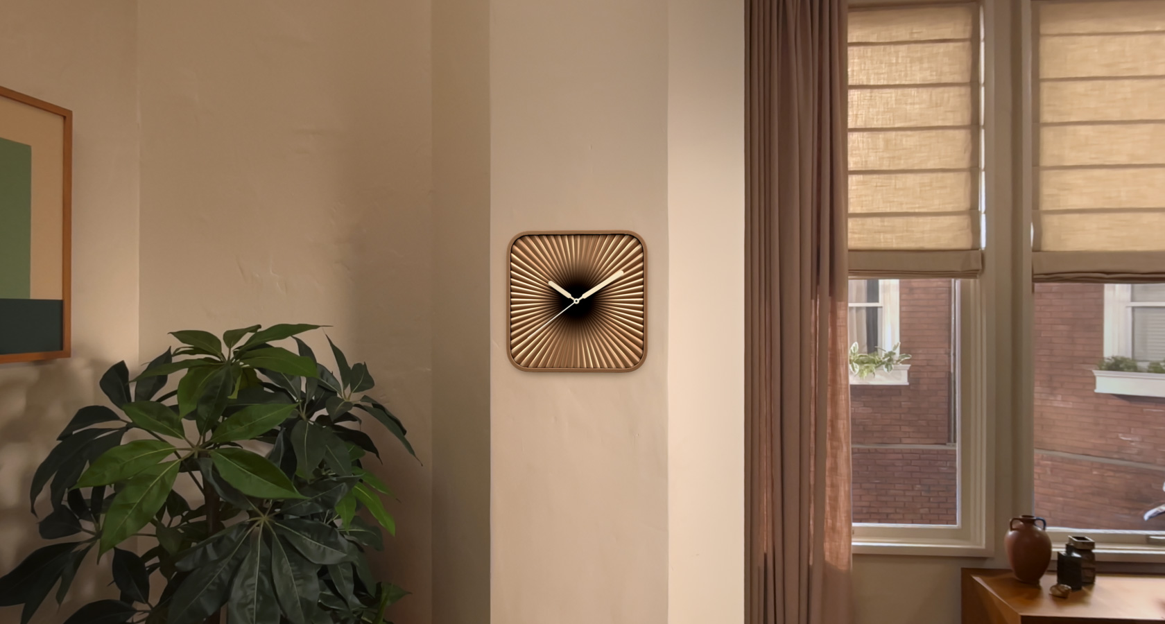 صورة مقربة لأداة الساعة في مساحة مادية على حائط يُنظر إليها من خلال Apple Vision Pro 